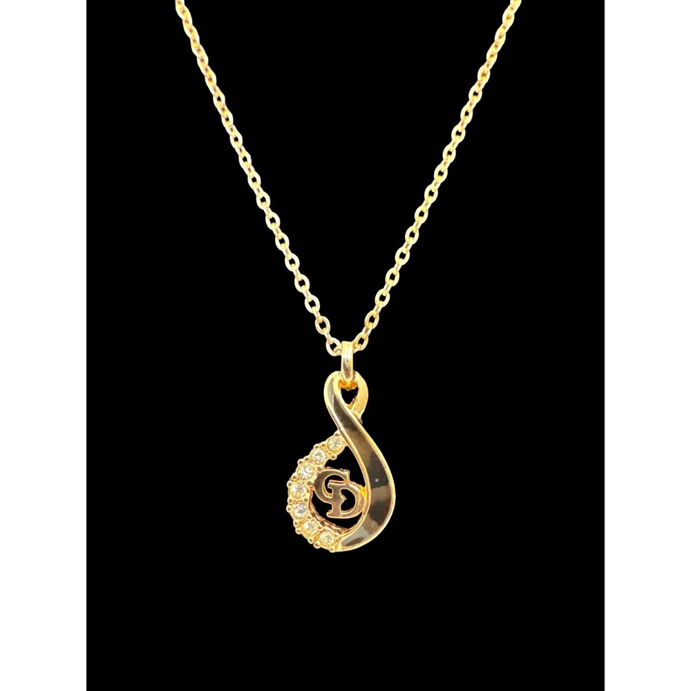 Christian Dior Infinity Necklace Gold Tone Crystal Pendant Chain Elegant Vintage